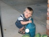 Jarrod thinks Nana's watering can is just incredibly fun. Its full of water!